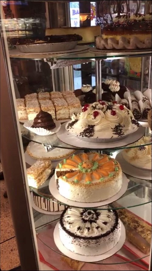 A case of cream-filled pastries and cakes at Twin Pines Diner