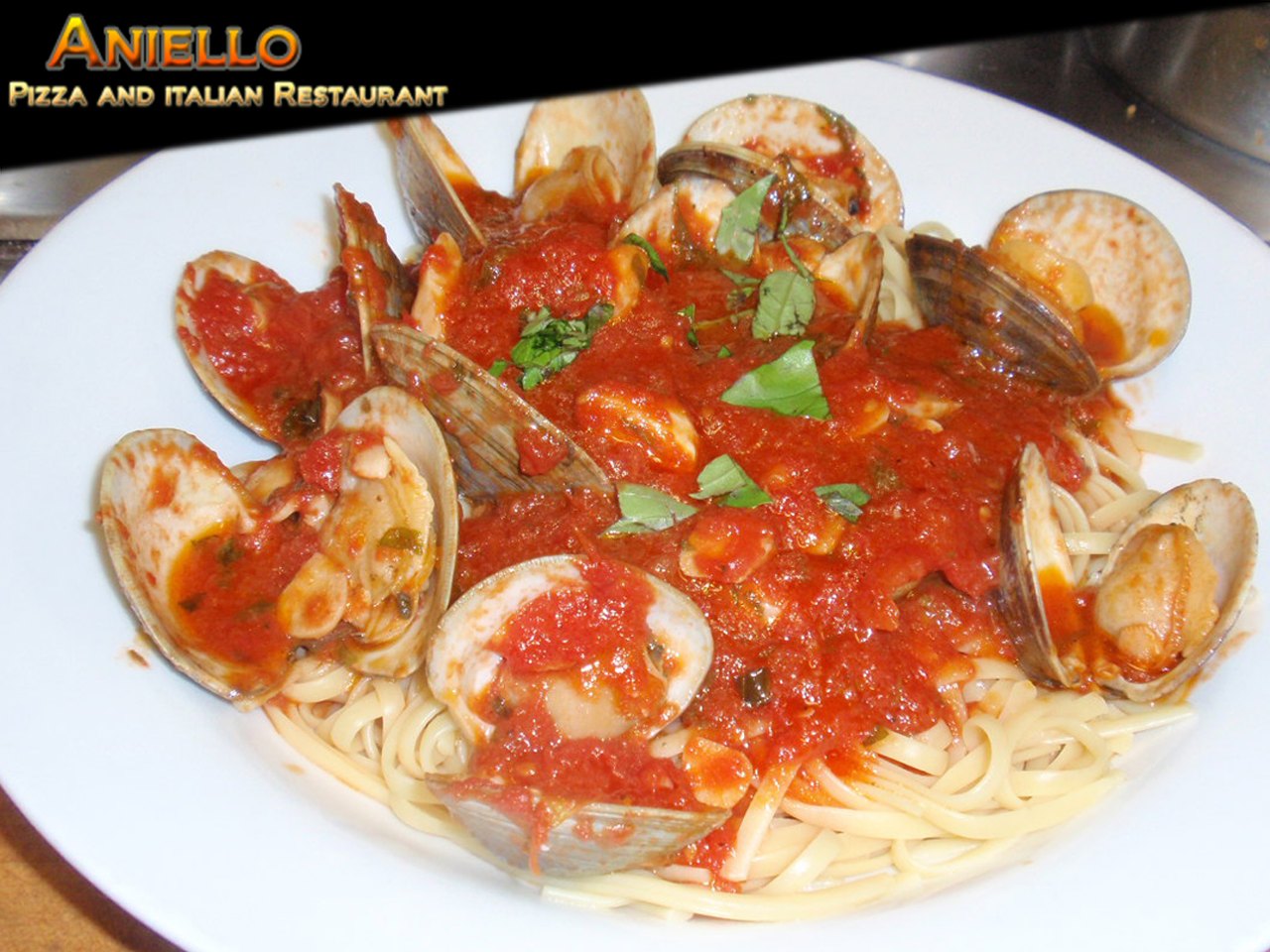 Linguine with clams in red sauce at Aniello's