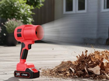 Red Wood Ranger cordless leaf blower clearing leaves from a patio